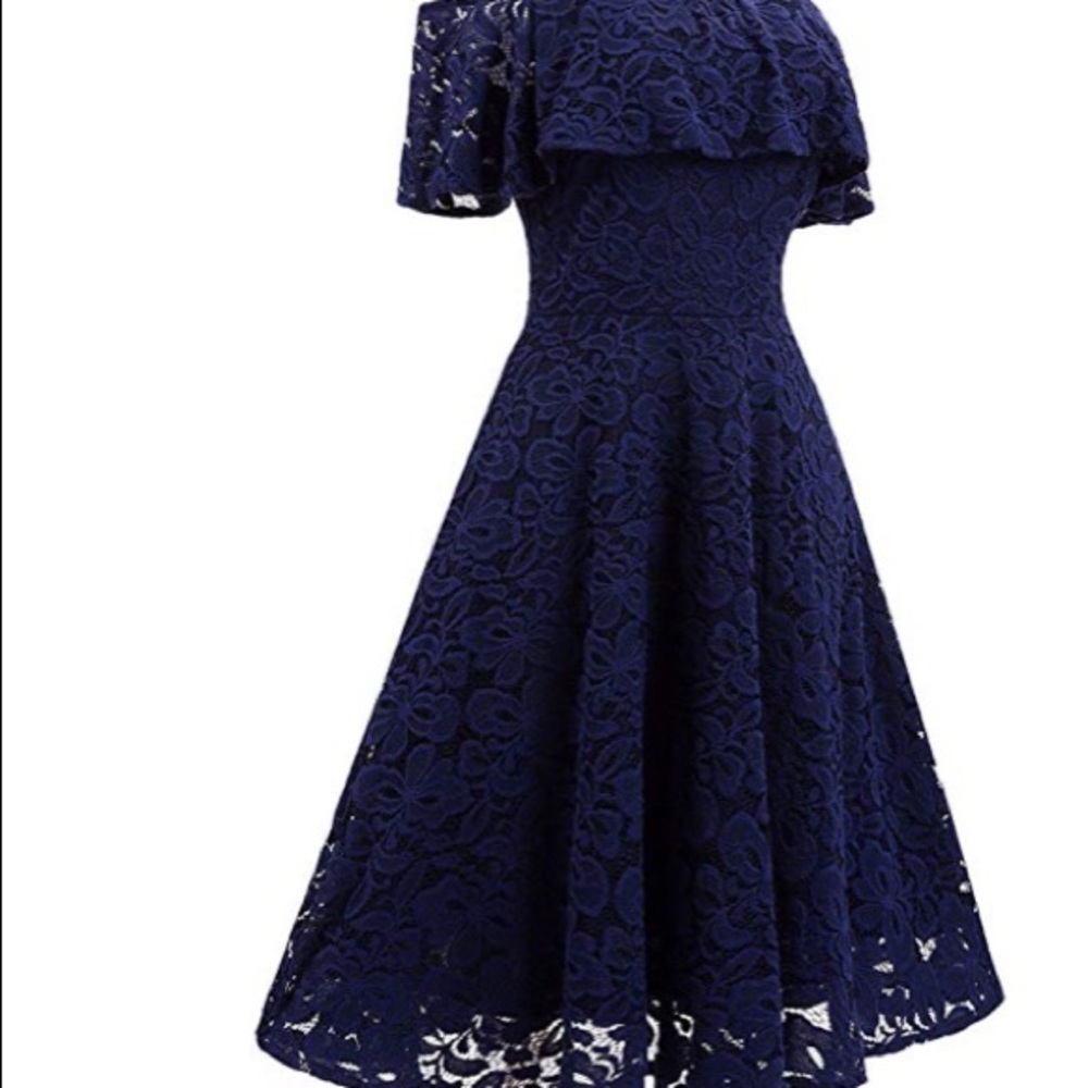 An off the shoulder navy blue dress